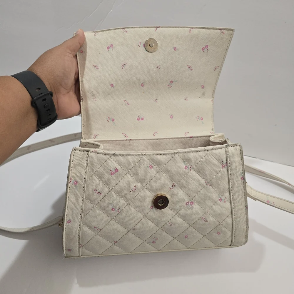 Under One Sky Cream Quilted Crossbody Bag with Gold Butterfly